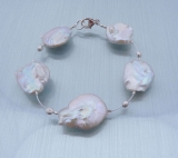 Suesswasserzuchtperlenset "Discus" Halskette, Armband und Ohrringe - verkauft