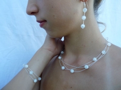 Halskette, Armband und Ohrringe aus gecreshtem Bergkristall - verkauft -