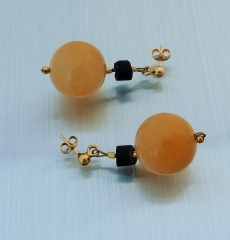 Ohrringe aus Orangencalcit und Lava